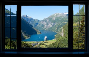 view trough a window to geiranger fjord in norway